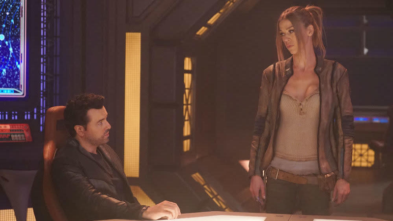 Ed, Kelly (Adrianne Palicki), and Kelly’s “dystopian future in space” cleavage.